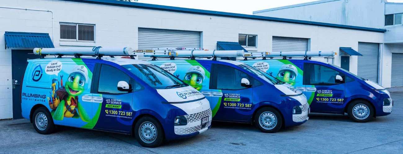 Wollongong Plumbing and Hot Water vans lined up at the depot